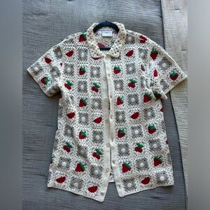 Like new men’s knitted top with fruit detailing